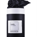 the twelfth element Black Cardboard Tube with Black Tissue Paper On A White Background